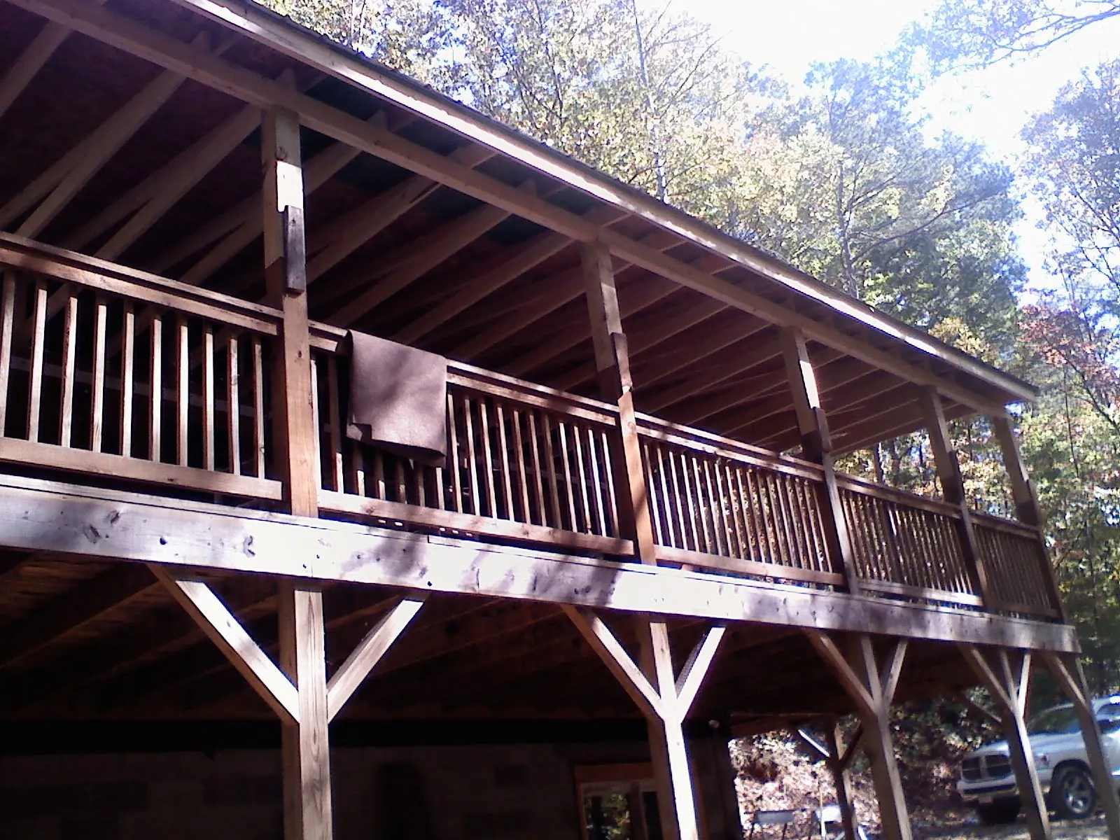 Timber framing under a new elevated porch and deck — Roof Leak Repair in Brockton by Roofing Brothers